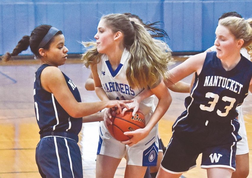 Ann Hoehlein of Falmouth Academy is tied up by Annalisa Crooks (left) and Maclaine Willett in Nantucket's 37-27 win on Monday.