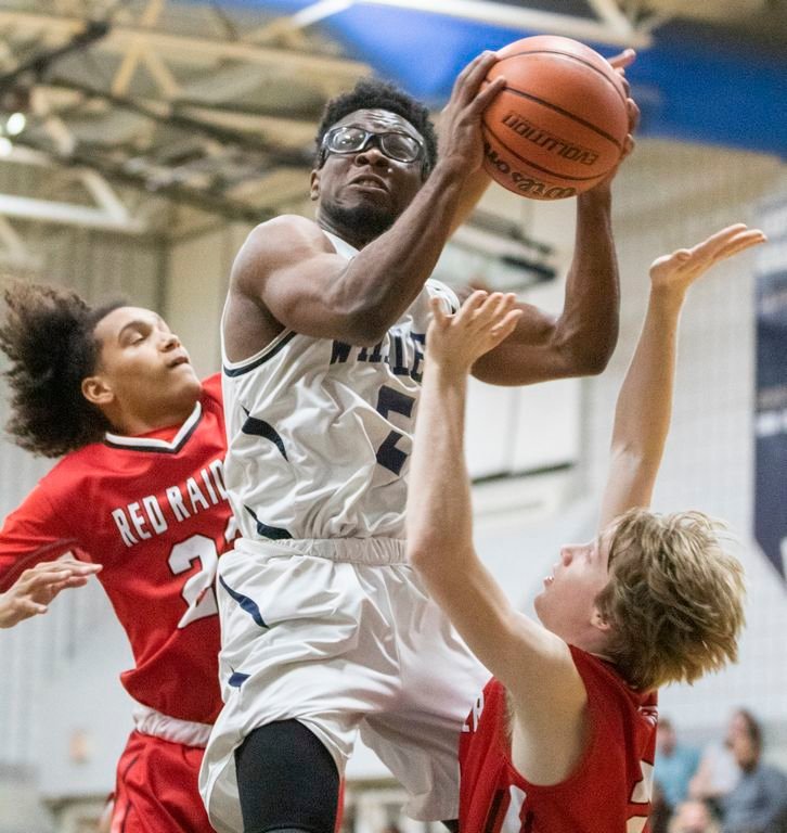 Devonte Usher drives to the basket in Nantucket's 56-45 home win over Barnstable Tuesday.