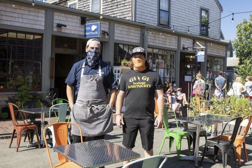 Liam Mackey and Clinton Terry of Nautilus in their outdoor seating area on Cambridge Street this week.