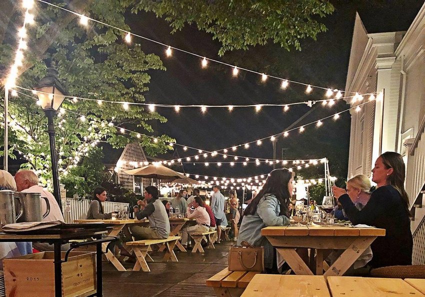 Outdoor dining on Oak Street for Ventuno and John Keane's two restaurants Town and Queequeg's.