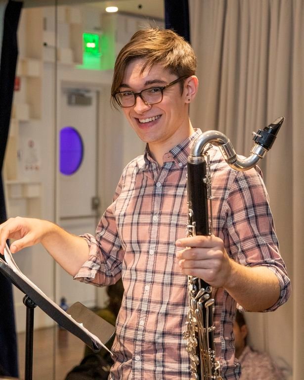 Nick Davies holding his bass clarinet