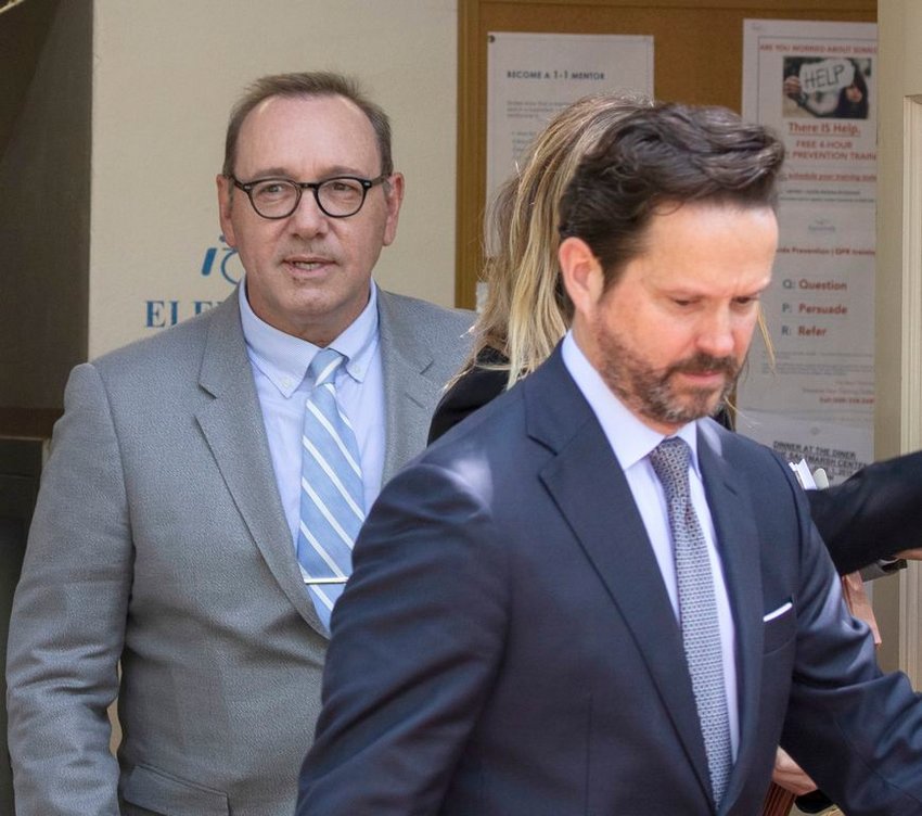 Attorney Alan Jackson leads actor Kevin Spacey out of the Nantucket Town and County Building last month following his pretrial hearing on indecent assault charges.