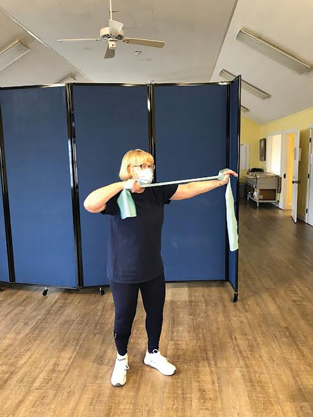 Nancy Swain leads an online senior aerobics class at an empty Saltmarsh Senior Center earlier this month.