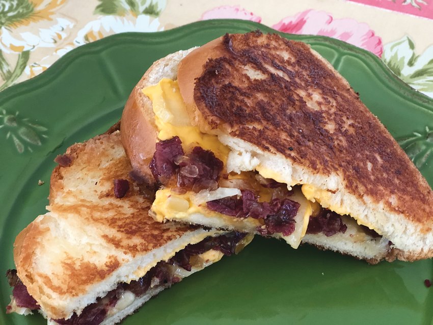 This Challah Grilled Cheese with Pastrami Jam is made with two kinds of cheese &ndash; American and Gruy&egrave;re &ndash; and grilled with mayonnaise instead of butter for a perfect golden crust.