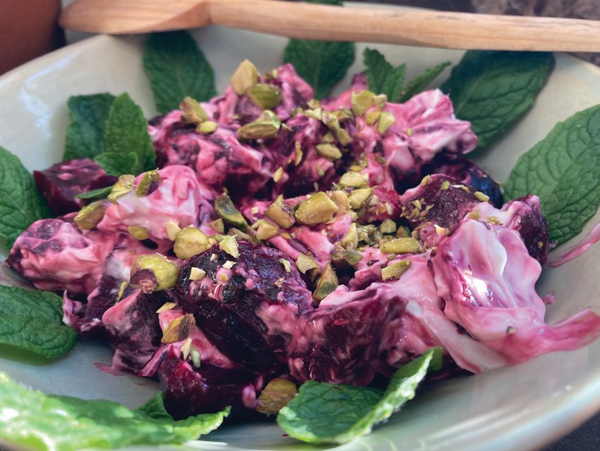 Beet salad with labne or sour cream and pistachios.