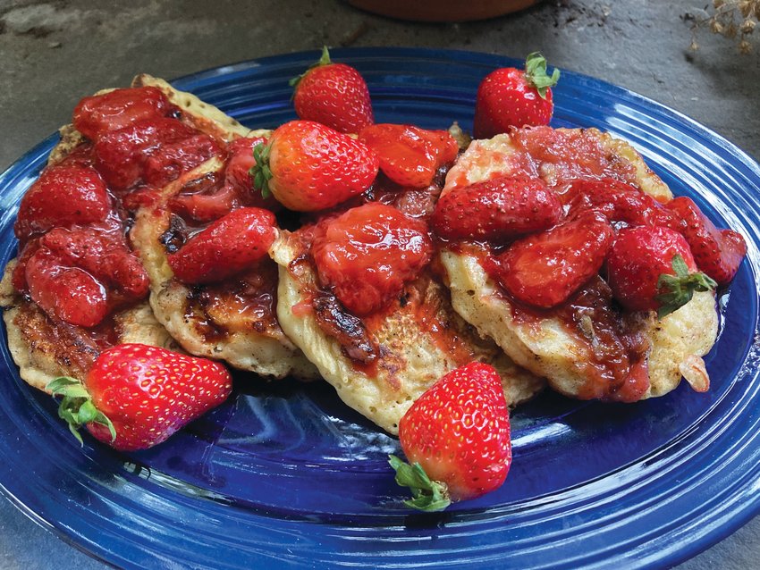 The roasted rhubarb and roasted strawberry sauce may be made ahead of time for this pancake breakfast.