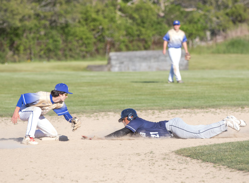 Nunez Hernandez dives in safe to start off a huge sixth inning for Whalers.