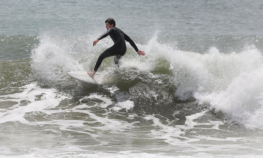 Wednesday was a popular day for surfers along the south shore as swells from an offshore storm provided good conditions.
