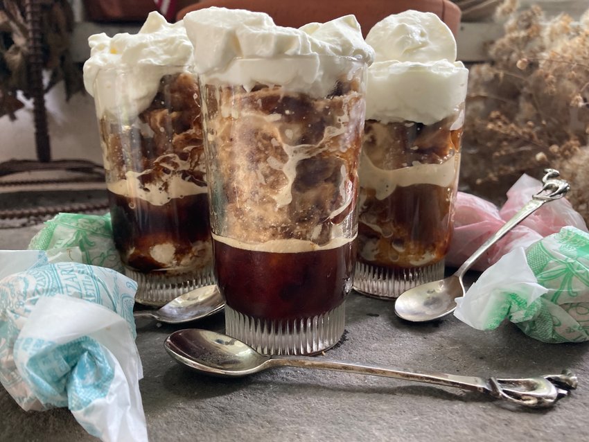 Granita al Caffe con Panna, sweet espresso ice topped with unsweetened whipped cream.