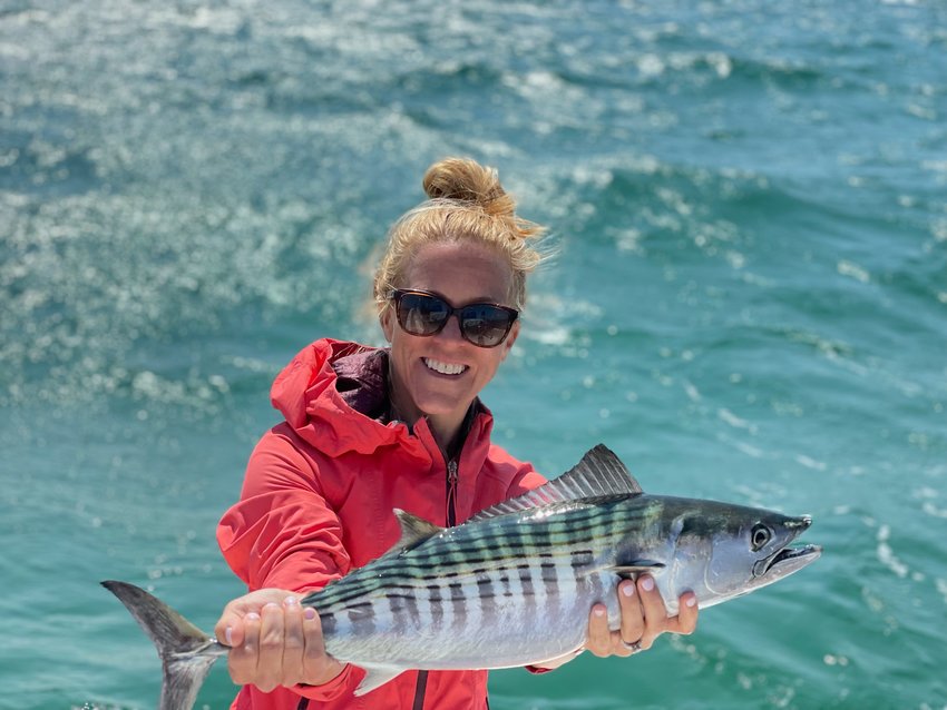 Carrie Chapman with a bonito she caught this week.