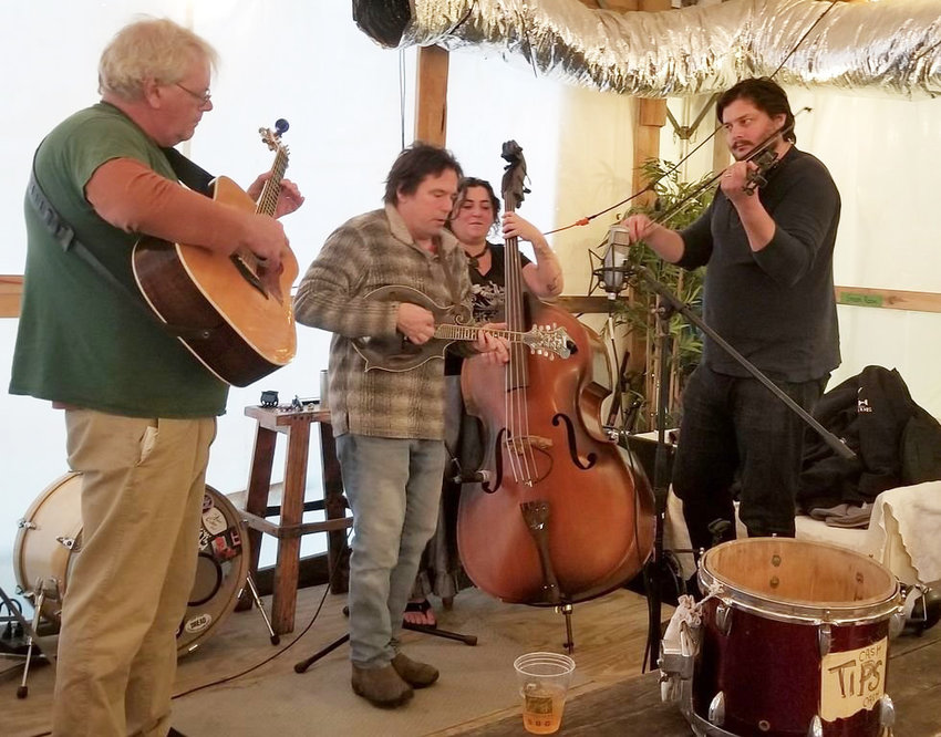 Members of Four EZ Payments from left is Bob Dickinson, Rob Dunbar, Lucy Van Arsdale and Caleb Cressman playing at Cisco Brewery last winter.