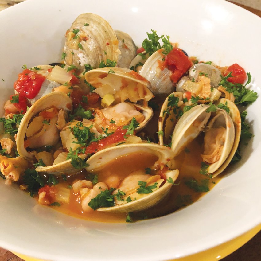 This Clam, White Bean and Fino Sherry Stew can be enhanced by adding extra chopped fresh clams to those in the shell.