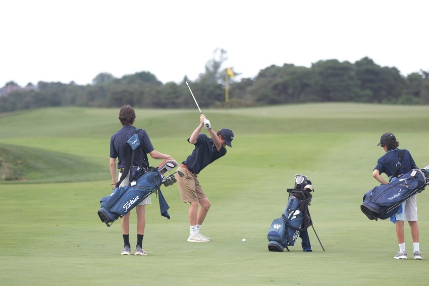 Griffin Starr prepares to hit a shot from the fairway on the back nine at Miacomet in Nantucket&rsquo;s season-opening 4-3 win over Cape Cod Academy Tuesday.