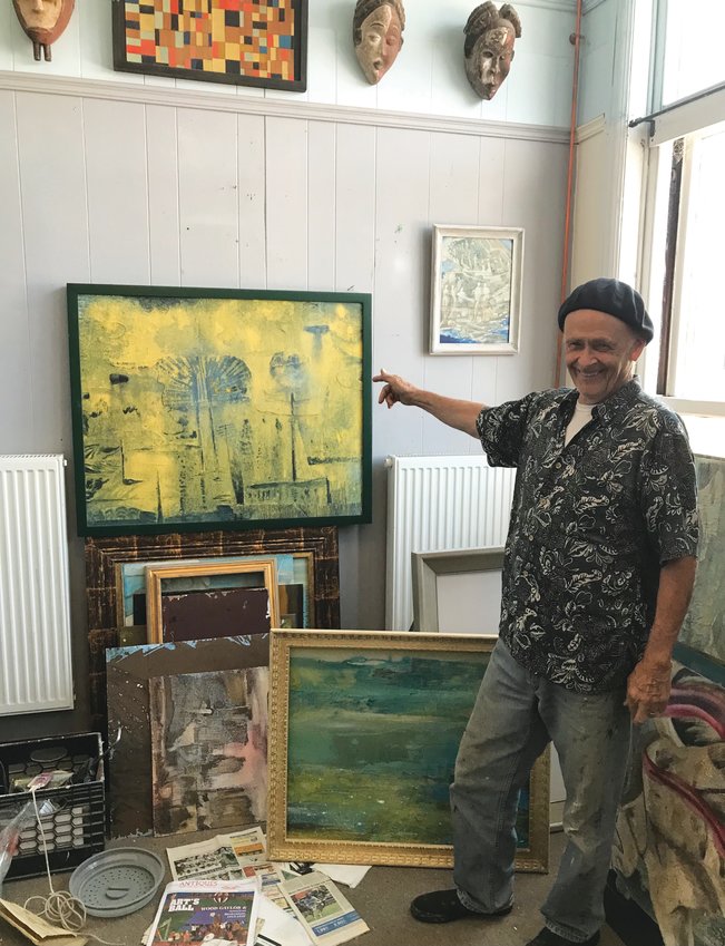 David Bradstreet Wiggins in his New Hampshire studio with one of his abstract expressionist works.