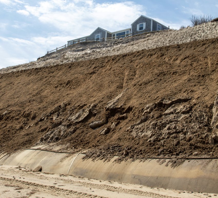 This photo, showing the geotextile tubes at the toe of the Sankaty Bluff, partially covered with sand, was taken in March 2020. Proponents say the geotubes have been effective in preventing further erosion of the bluff in the area where they have been installed.