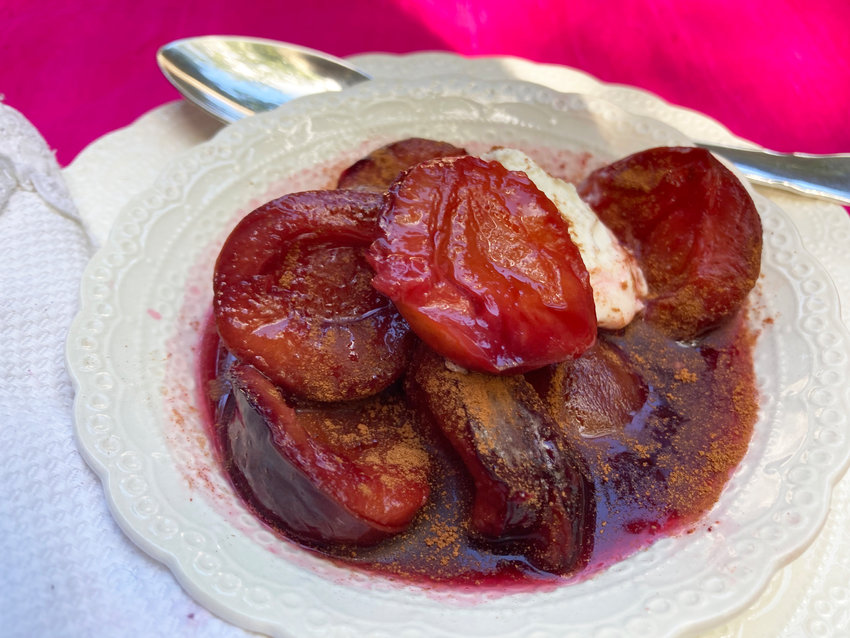 These plums are poached in a combination of wine and vermouth to bring out their natural flavor.