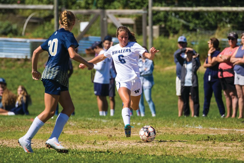 The girls varsity soccer team, seen here against East Bridgewater, will host Falmouth Tuesday and Nauset Thursday.