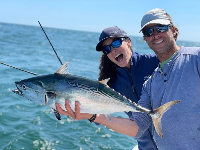 Capt. Corey Gammill and Stef Beer with a false albacore and a broken rod.