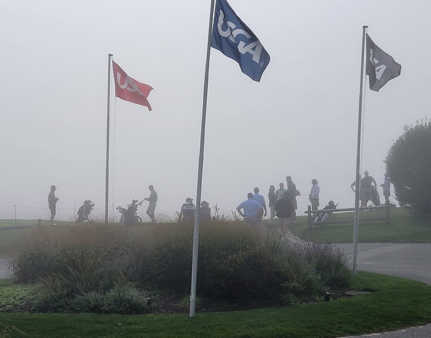 Players wait out one of a number of fog delays at Sankaty on Saturday.