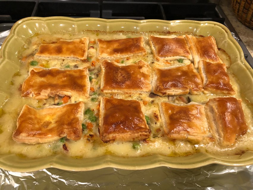 This recipe for Chicken Pot Pie with Leeks and Thyme saves time by using a store-bought puff-pastry topping.