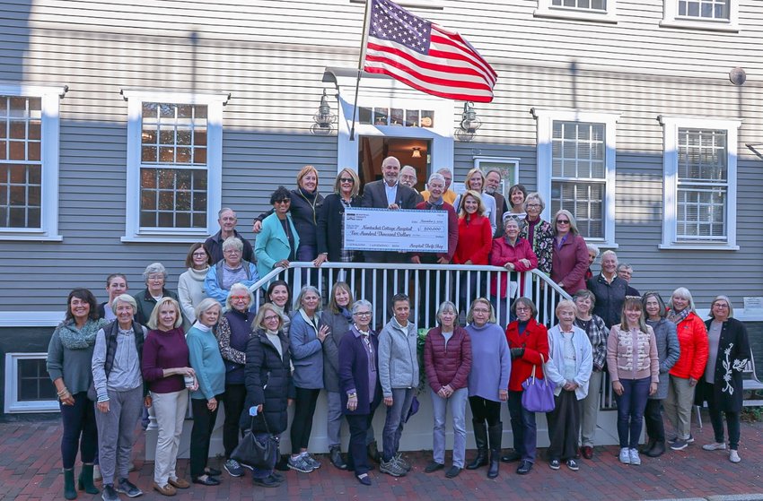 Volunteers outside The Hospital Thrift Shop Tuesday, where the shop presented Nantucket Cottage Hospital a $500,000 gift from its summer proceeds.