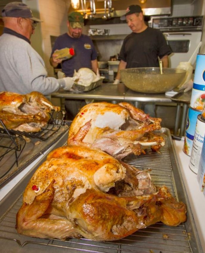 American Legion members prepare the community Thanksgiving dinner in Legion Hall.
