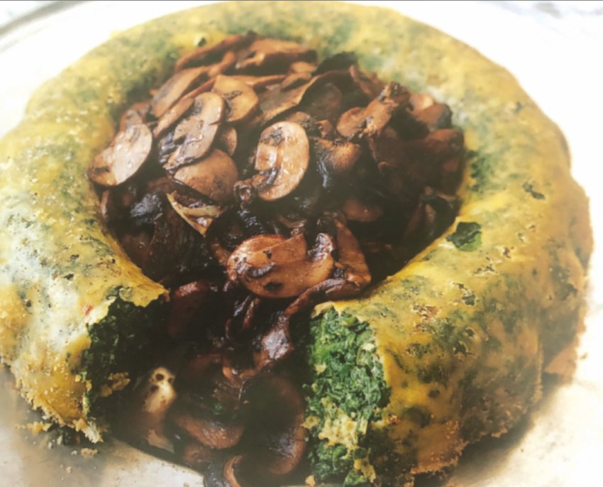 Spinach pudding with truffled mushrooms is labor-intensive, but a delicious, fancy and non-traditional way to showcase greens at Thanksgiving.