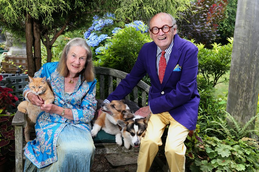 Beverly Hall and David Billings with their trusty Corgis and their cat Caper.