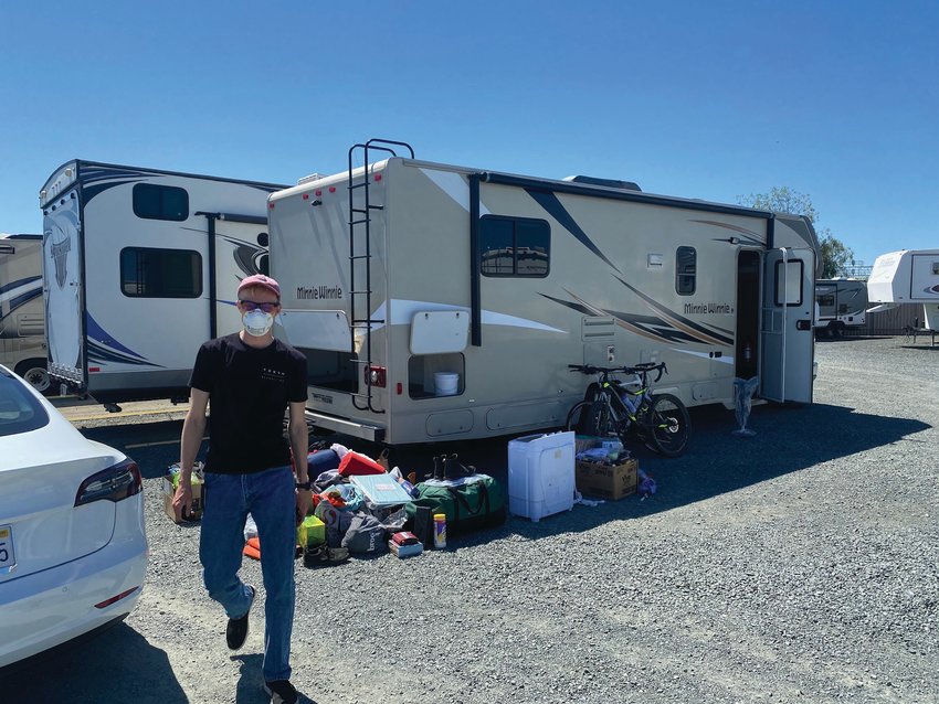 Ben Parker outside the RV he used to take a 5,400-mile road trip through the American West, where he hatched the idea to develop electric power systems for recreational vehicles.