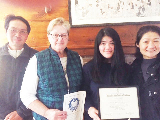 Nantucket High School senior Kathryn Kyomitmaitee, second from right, received the Abiah Folger Franklin chapter of the Daughters of the American Revolution's Good Citizen Award. From left are her father Somrit, DAR member Nancy Larrabee, Kyomitmaitee and her mother Laong.