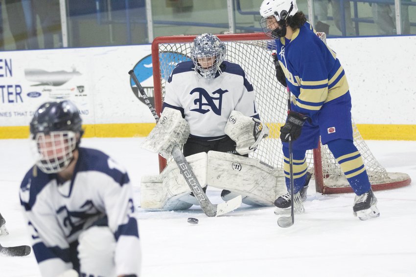 Griffin Starr makes a point-blank save Jan. 23 against Norwell. Starr has been a force in net all season for the Whalers.