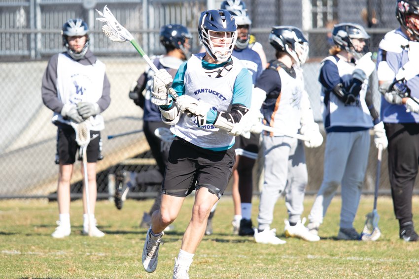 Justin Roethke in action during practice this week. The boys lacrosse team will travel to Pembroke to open the season Saturday.