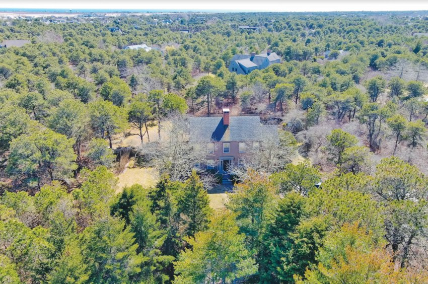 Nestled in the Middle Moors on 2.53 acres, this expansive Milestone Road property includes a main house, workshop and guest cottage.