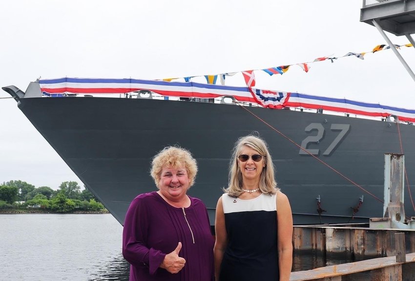 Harbormaster Sheila Lucey, left, and Town manager Libby Gibson at the christening of the USS Nantucket in Wisconsin last August.
