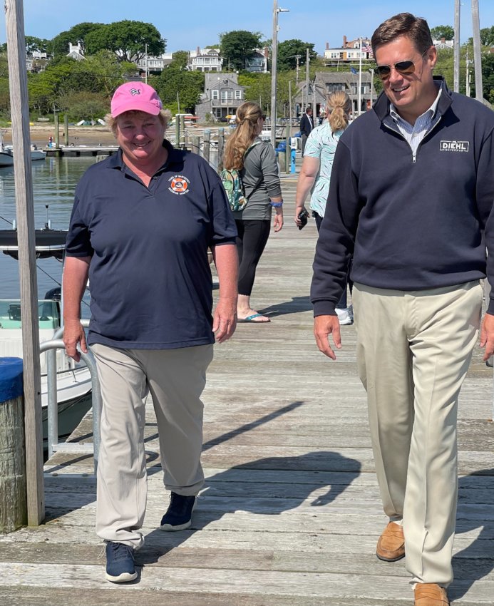 Republican candidate for governor Geoff Diehl, right, and Nantucket Harbormaster Sheila Lucey on the docks Thursday.
