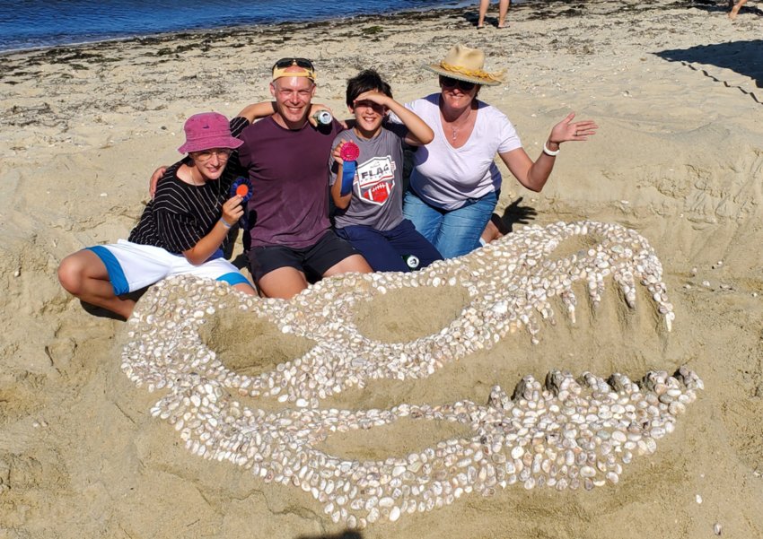 &ldquo;T-Rex&rdquo; by Team Heroes, Kate Bowen, Jake Knowles, Alea and Rubin Bowen-Knowles, won the grand prize in Saturday&rsquo;s Nantucket Island School of Design and the Arts Sandcastle and Sculpture Contest at Jetties Beach.