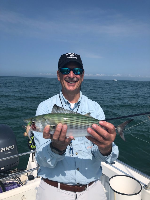 Peter Grua with a Bonito caught on a fly.