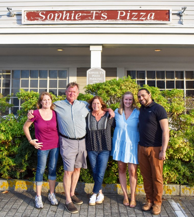 From left, Emily Clarkson, Rob Noll, Kelly Noll, Sophie Noll and Randy Javier outside Sophie T&rsquo;s Pizza.