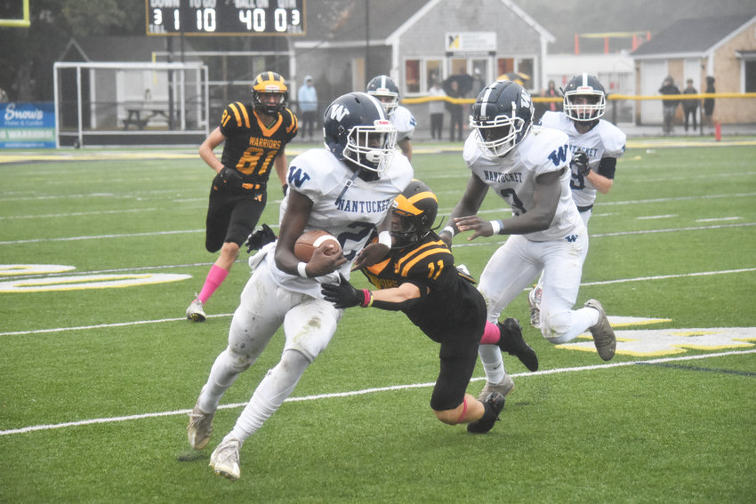 Jayquan Francis turns the corner against Nauset Friday.