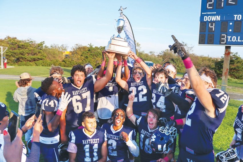 the Whalers celebrate after their 27-7 home win over Martha's Vineyard in the 2021 Island Cup.