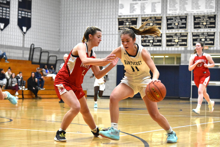 Adney Brannigan works against a Barnstable defender during the Whalers&rsquo; 55-31 loss to the Red Hawks at home Tuesday.