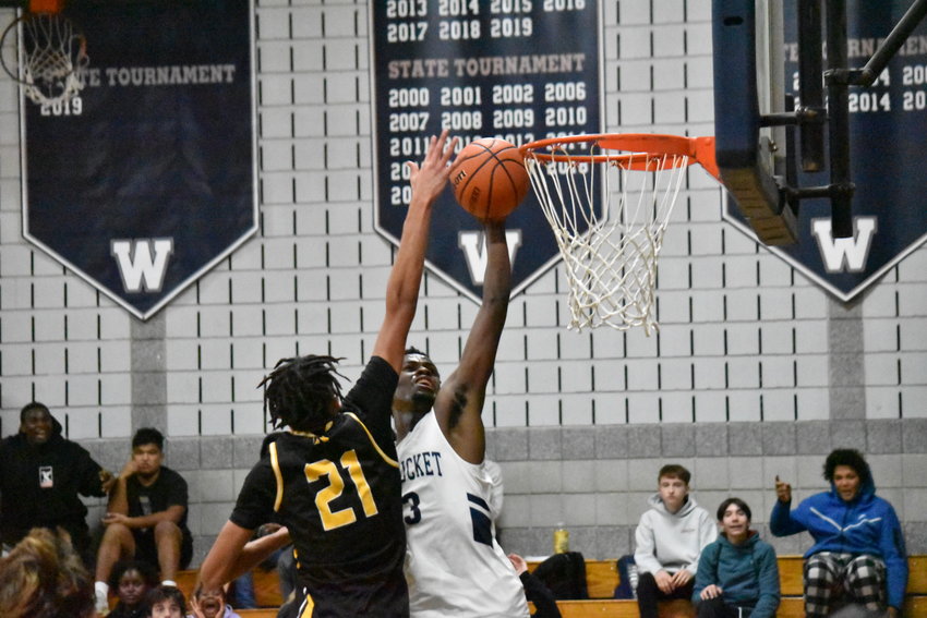 Jayquan Francis drives to the basket during the Whalers&rsquo; 50-48 loss last Thursday against Nauset in the team&rsquo;s home opener.
