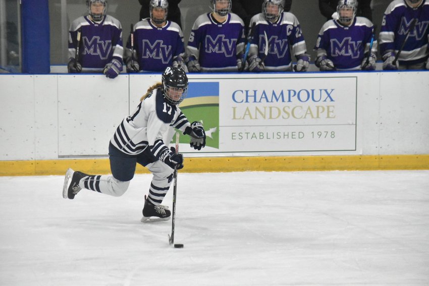 Bailey Lower carries the puck past the Martha&rsquo;s Vineyard bench during Sunday&rsquo;s game.