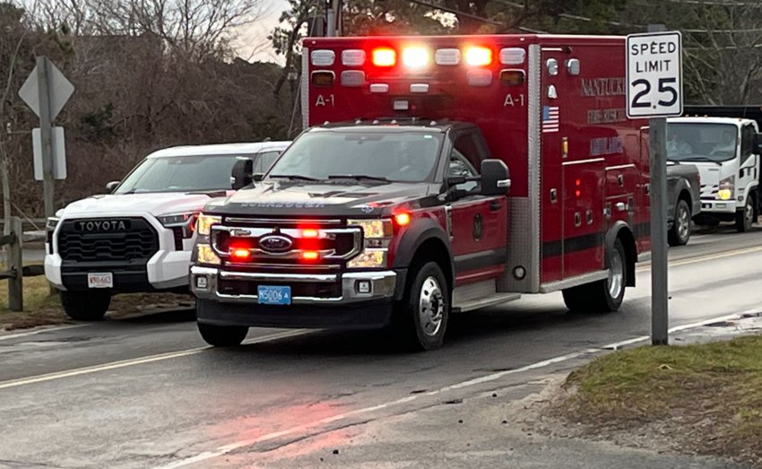 A Nantucket Fire Department ambulance rushes toward Nantucket Cottage Hospital Monday carrying a man who suffered severe head injuries after being struck by heavy equipment on Arrowhead Drive.