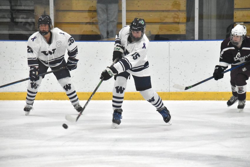Mia Beaudette rips a shot during Saturday's 7-1 loss to Falmouth.