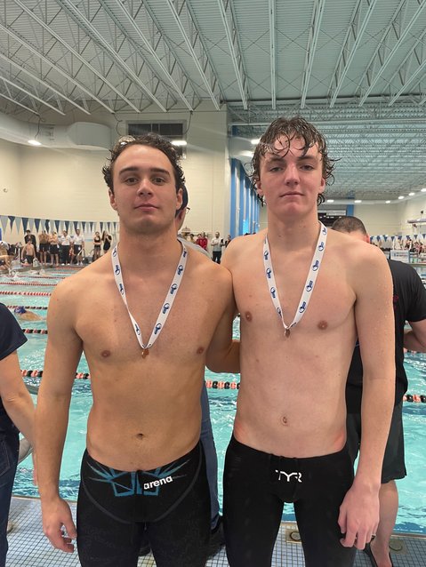 Justin Roethke, left, and Jake Johnson both posted season-best times during Sunday's South Sectionals.