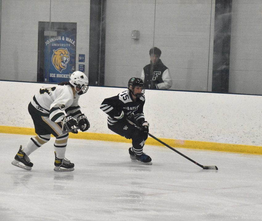 Mia Beaudette skates around a Bishop Feehan defender earlier this season.