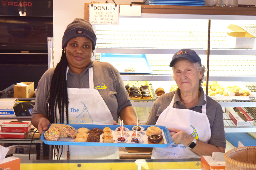 Noreen Ferguson, left, and Louise Hubbard show off some of the gluten-free options at Nantucket Bake Shop.