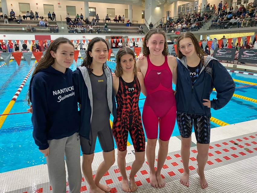 From left, Hannah Harrington, Hannah Gerardi, Martina Savova, Myah Johnson and Sara Dussault at Saturday&rsquo;s state swim meet.