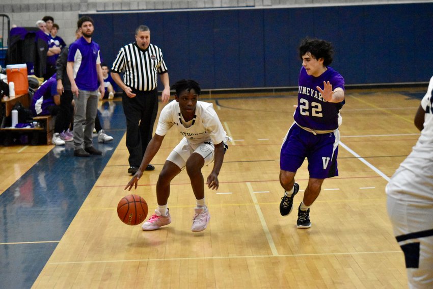 Amare Bramwell dribbles past a Martha&rsquo;s Vineyard player during the Whalers&rsquo; 44-41 loss Jan. 28.